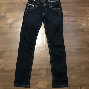Buckle skinny jeans